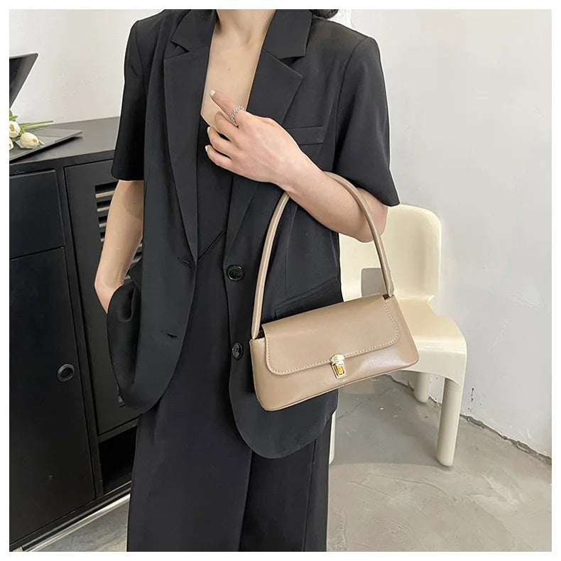 MINIMALIST STRUCTURED UNDERARM BAG