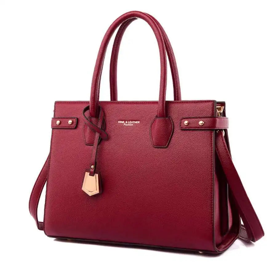 STRUCTURED LEATHER TOP-HANDLE HANDBAG