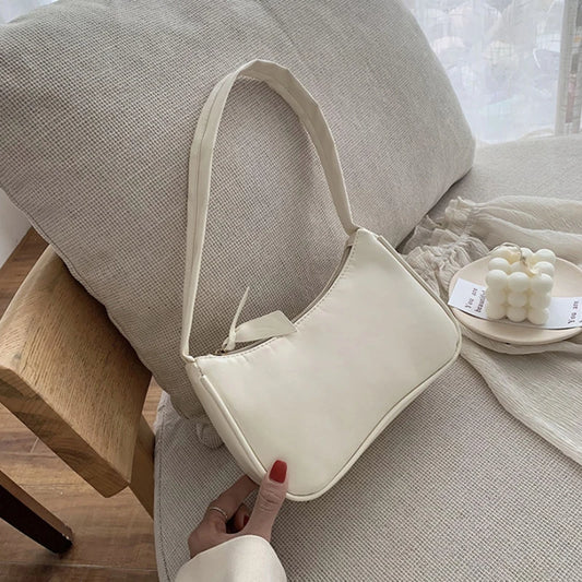 MINIMALIST SIGNATURE HANDBAG