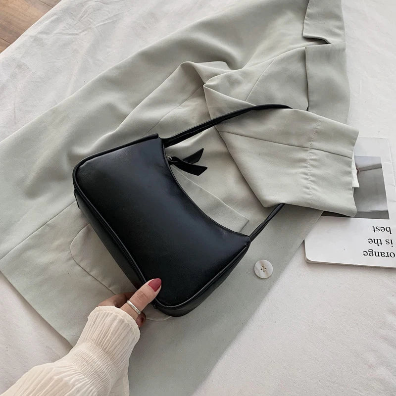 MINIMALIST SIGNATURE HANDBAG