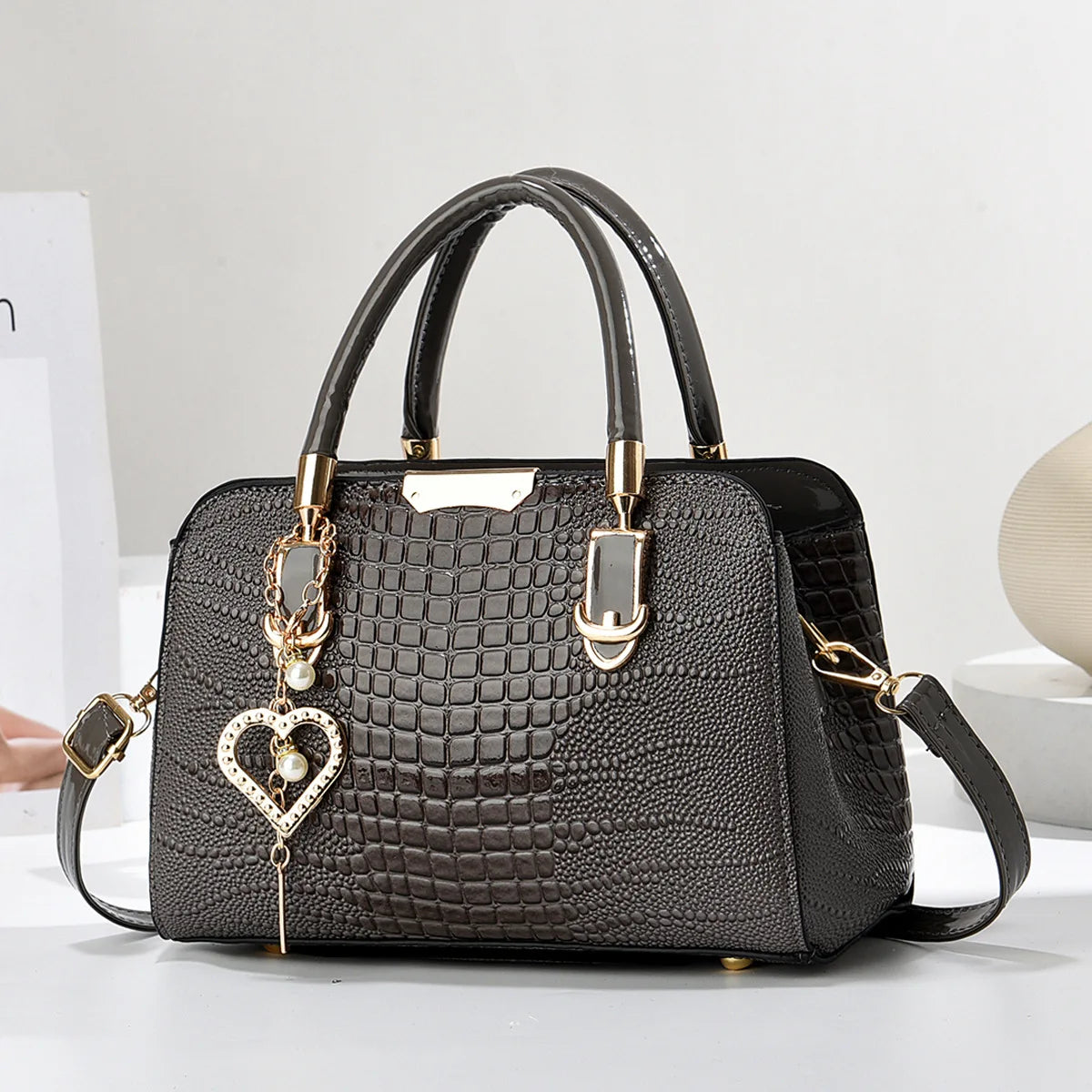 CROCODILE-TEXTURE STRUCTURED TOP-HANDLE HANDBAG