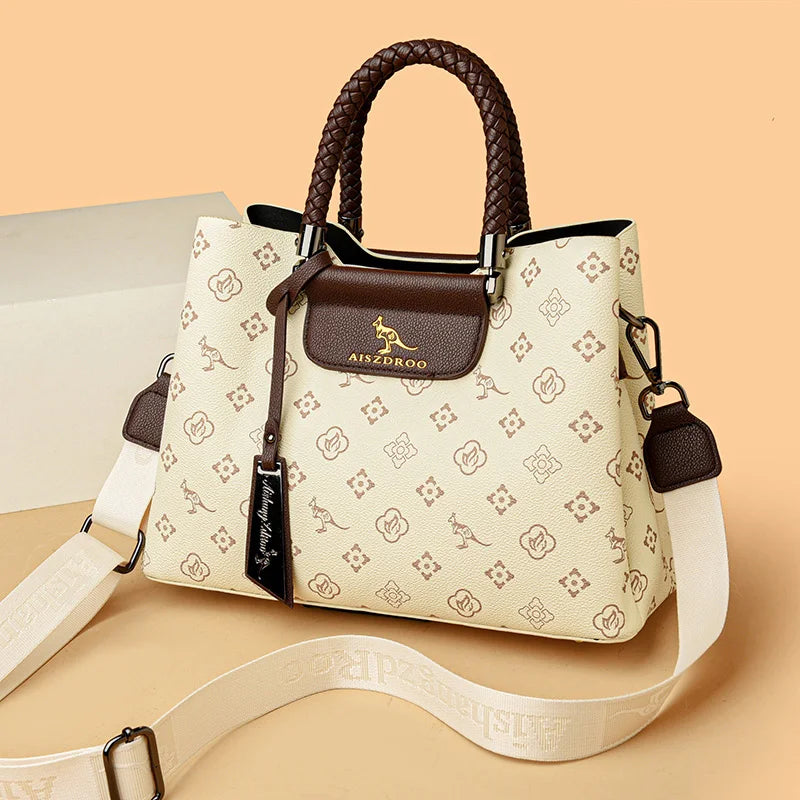SIGNATURE MONOGRAM BRAIDED TOTE – LUXURY STRUCTURED HANDBAG