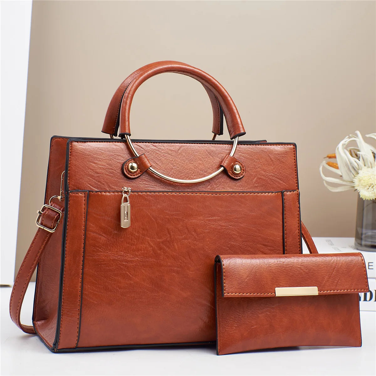 STRUCTURED LEATHER HANDBAG WITH MATCHING WALLET