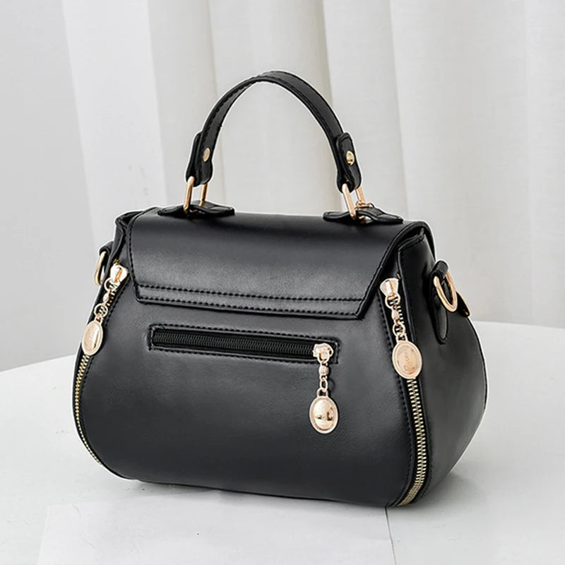 EMBROIDERED STRUCTURED TOP‑HANDLE CROSSBODY