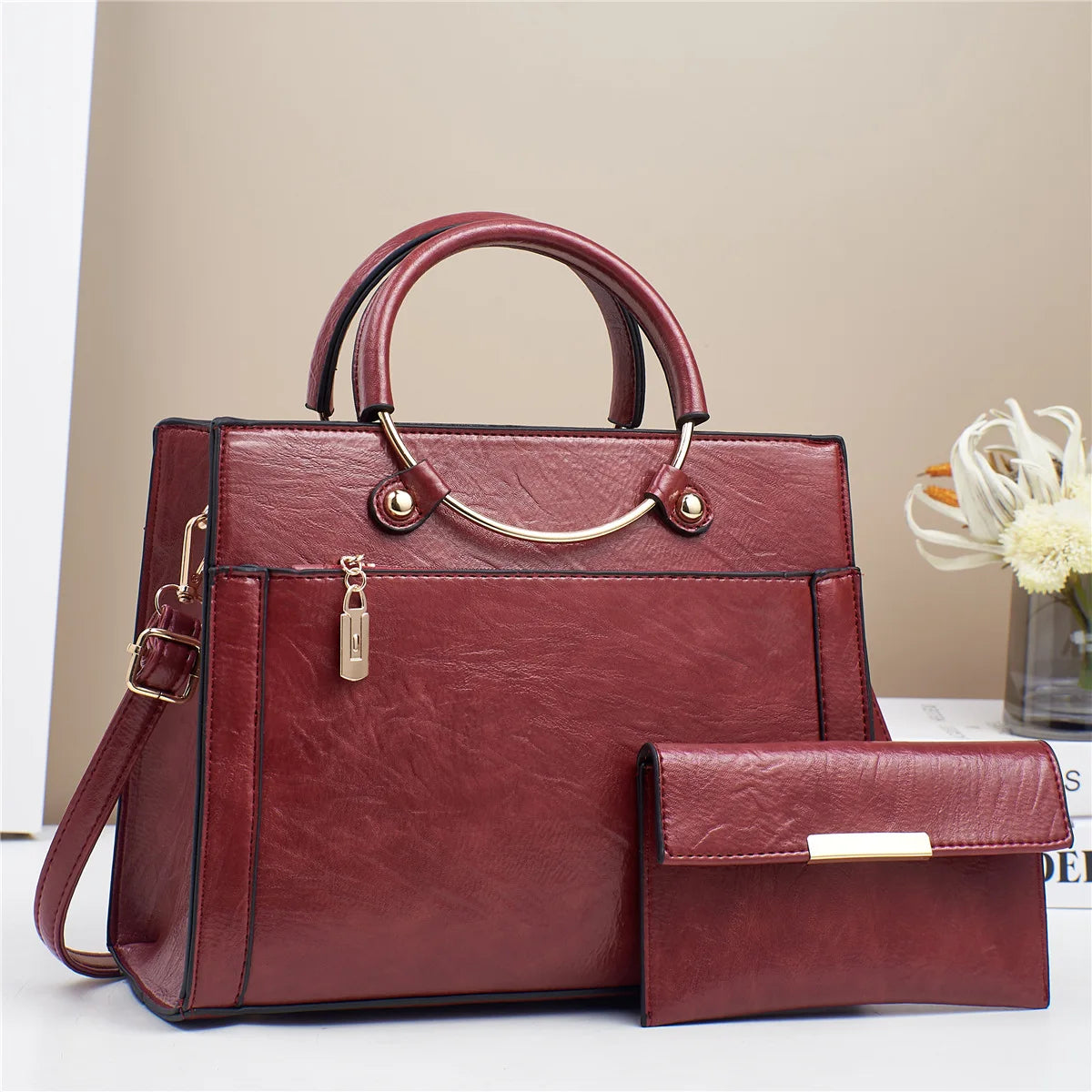 STRUCTURED LEATHER HANDBAG WITH MATCHING WALLET