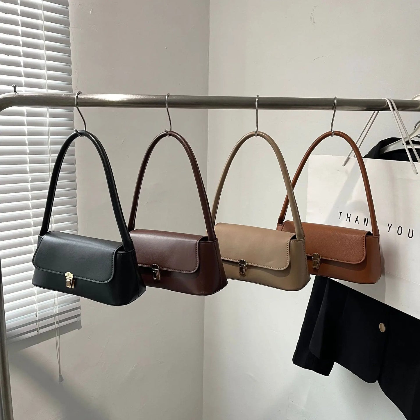 MINIMALIST STRUCTURED UNDERARM BAG