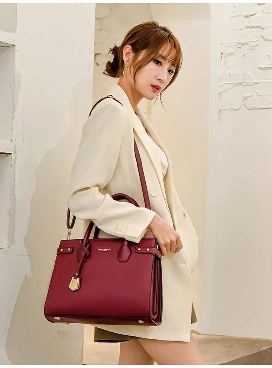 STRUCTURED LEATHER TOP-HANDLE HANDBAG