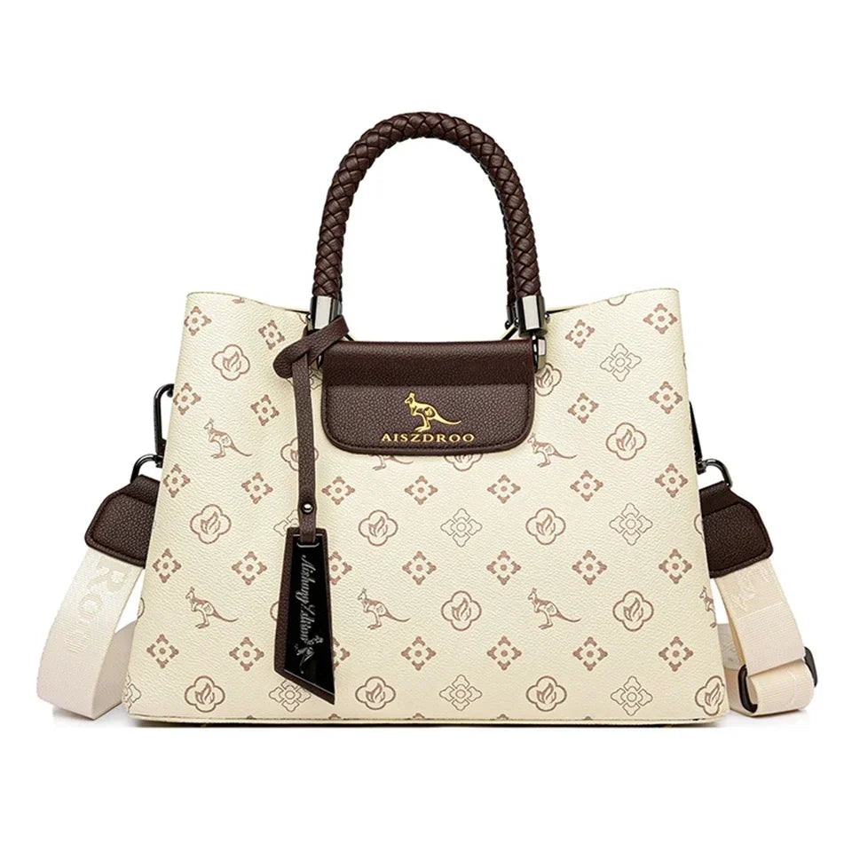 SIGNATURE MONOGRAM BRAIDED TOTE – LUXURY STRUCTURED HANDBAG