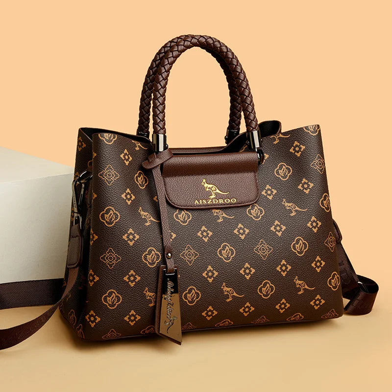 SIGNATURE MONOGRAM BRAIDED TOTE – LUXURY STRUCTURED HANDBAG