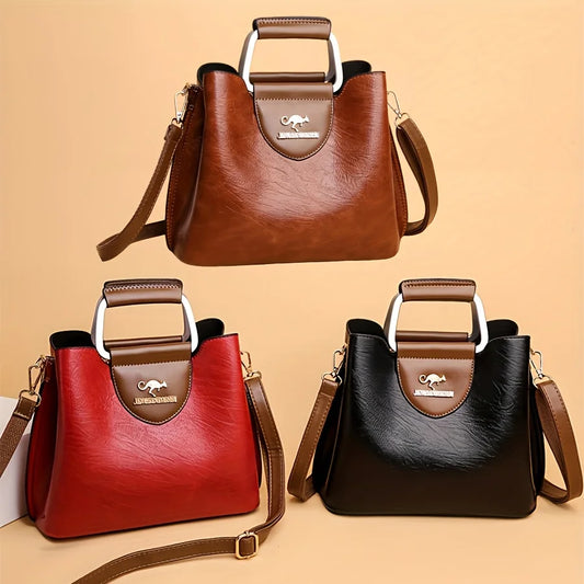 EMBOSSED STRUCTURED TOP‑HANDLE BAG
