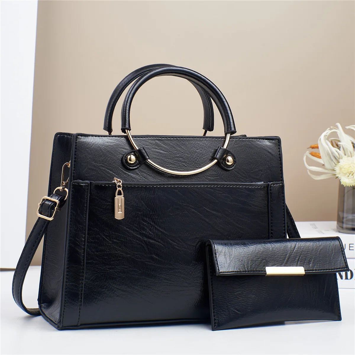 STRUCTURED LEATHER HANDBAG WITH MATCHING WALLET