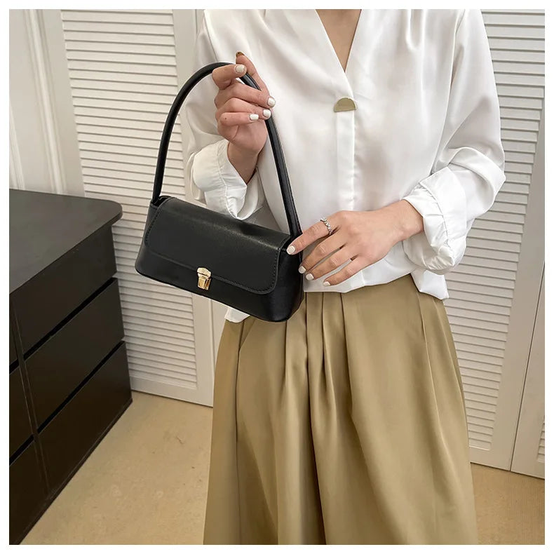 MINIMALIST STRUCTURED UNDERARM BAG