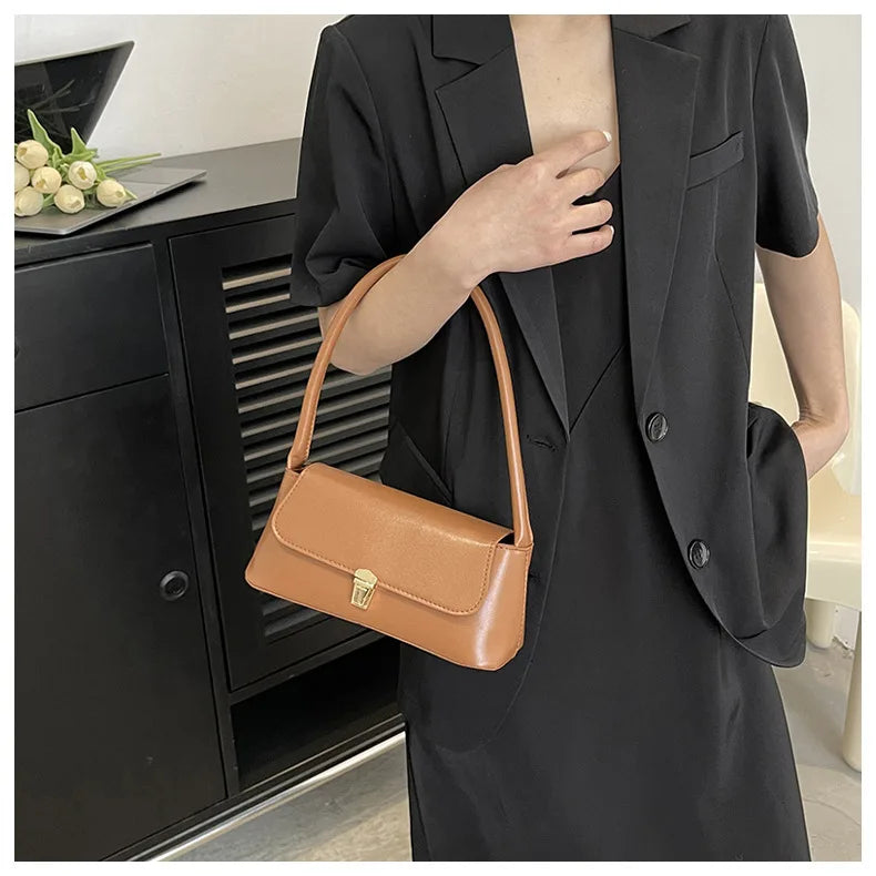 MINIMALIST STRUCTURED UNDERARM BAG
