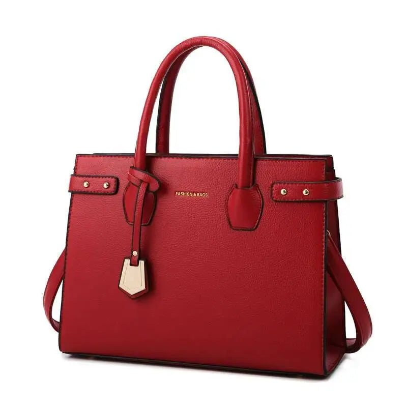 STRUCTURED LEATHER TOP-HANDLE HANDBAG