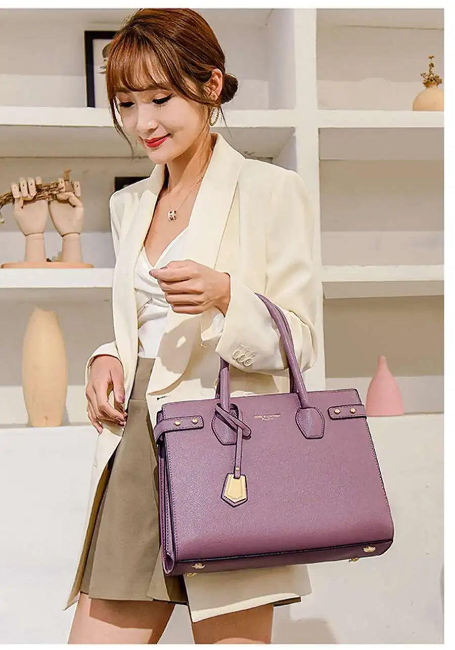 STRUCTURED LEATHER TOP-HANDLE HANDBAG