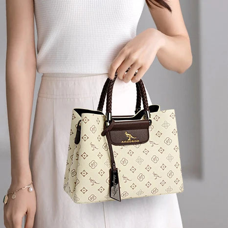 SIGNATURE MONOGRAM BRAIDED TOTE – LUXURY STRUCTURED HANDBAG