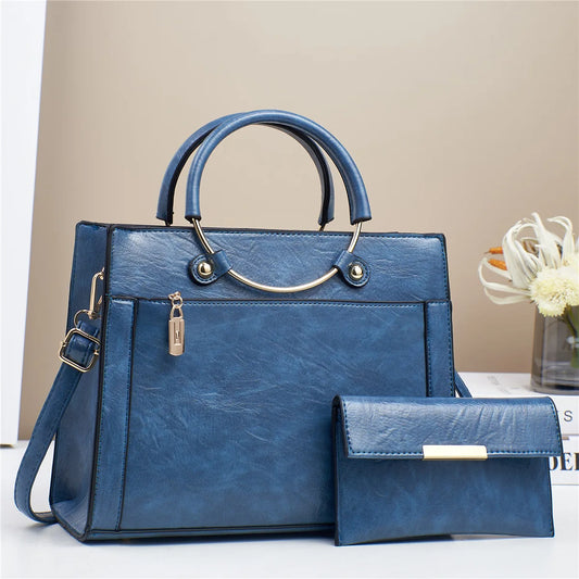 STRUCTURED LEATHER HANDBAG WITH MATCHING WALLET